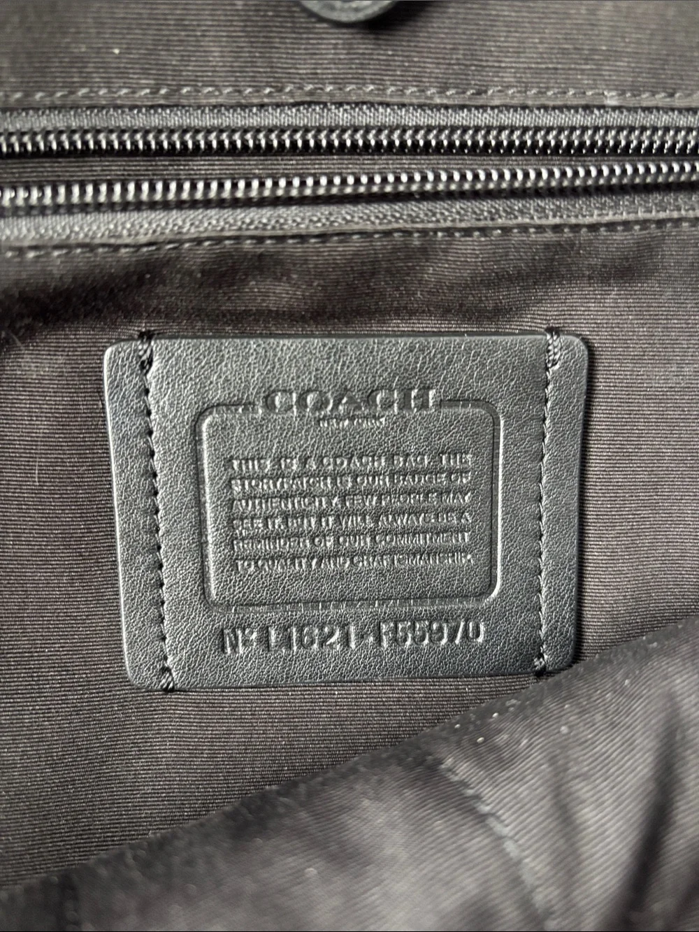 Coach sleek black